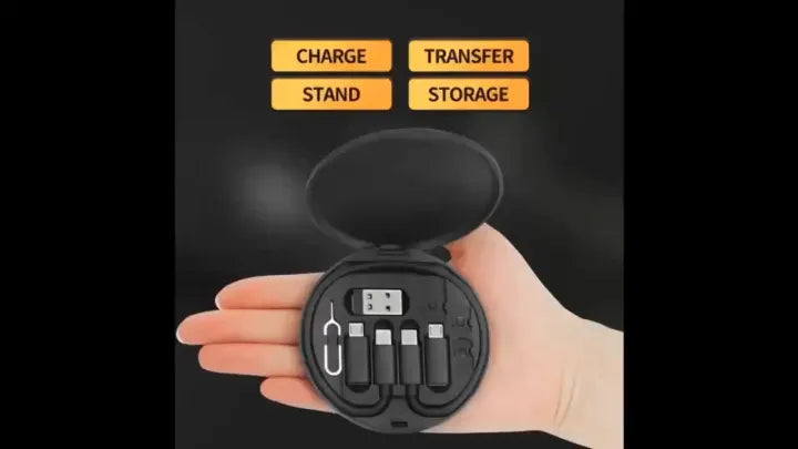 Black portable charging station held in a hand with text 'Charge', 'Stand', 'Transfer', 'Storage' on a dark background