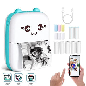 Small portable printer with cartoon face, ink cartridges, and smartphone displaying prints on a white background