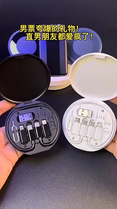 Two open containers with electronic components on a dark surface