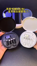 Two open containers with electronic components on a dark surface