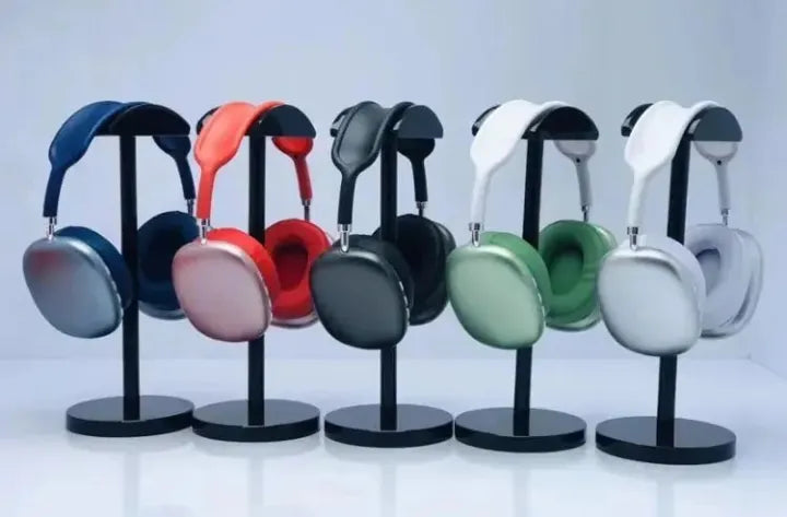 Set of headphones in various colors on stands against a light background