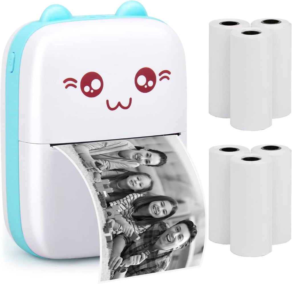 Small portable printer with a cute face design, printing a photo of a family, with additional paper rolls on a white background.